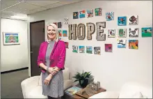  ?? [OKLAHOMAN ARCHIVES] ?? Since its opening in February 2017, Palomar has provided services to more than 7,000 victims of domestic violence. It is located in Midtown at 1140 N. Hudson. The agency's executive director is Kimberly Garrett, shown in their office.