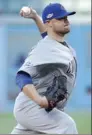  ?? AFP ?? Jon Lester of the Chicago Cubs pitches against the Los Angeles Dodgers in Thursday’s Game 5 of the NLCS at Dodger Stadium in Los Angeles.