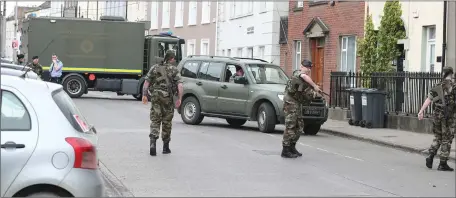  ??  ?? An army EOD team on Fair Street