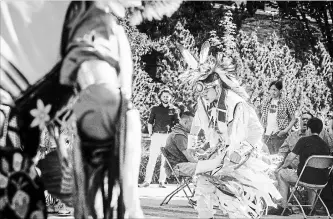  ?? MATTHEW SMITH THE CANADIAN PRESS FILE PHOTO ?? A dancer performs a ceremonial dance at a flag raising ceremony to honour residentia­l school and ’60s Scoop survivors in Saskatoon in May.