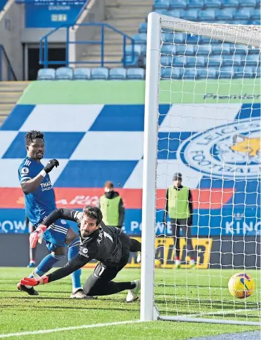  ??  ?? James Maddison, out of picture, fires past Liverpool goalkeeper Alisson to make it 1-1