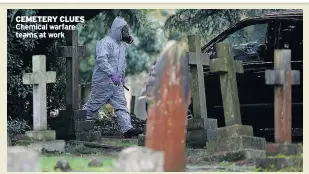  ??  ?? CEMETERY CLUES Chemical warfare teams at work