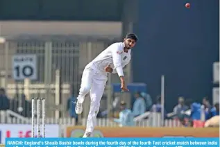  ?? ?? RANCHI: England’s Shoaib Bashir bowls during the fourth day of the fourth Test cricket match between India and England at the Jharkhand State Cricket Associatio­n (JSCA) Stadium in Ranchi. — AFP