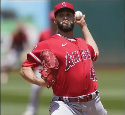  ?? JEFF CHIU — THE ASSOCIATED PRESS ?? The Angels’ Patrick Sandoval pitched 61⁄3 innings in his start against the Athletics to pick up the victory in Oakland on Sunday.