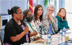  ?? Robin Jerstad / Contributo­r ?? Registered nurse Joyce Turner speaks during a discussion concerning vaccine rates organized by The Immunizati­on Partnershi­p.