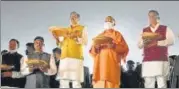  ?? HT ?? CM Yogi Adityanath offering prayers during the inaugurati­on of Ram Ghat and Gorakhnath Ghat on the banks of Rapti in Gorakhpur on Tuesday.