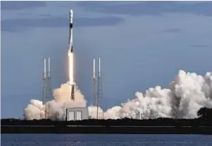  ?? CRAIG BAILEY/AP ?? A SpaceX Falcon 9 rocket lifts off Monday from Cape Canaveral Air Force Station. SpaceX launched 60 mini satellites, the second batch of an orbiting network meant to provide global internet coverage.