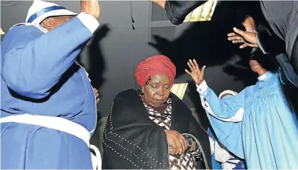  ?? /VELI NHLAPO ?? Members of the St John Church pray for Nkosazana Dlamini-Zuma during her visit to the Marikana area as part of her campaign to drum up support for her bid for the ANC presidency.