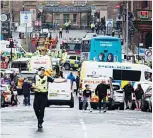  ??  ?? GLASGOW: Police attend the scene of a fatal stabbing incident at the Park Inn Hotel in central Glasgow on June 26, 2020. —AFP