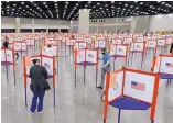  ?? TIMOTHY D. EASLEY/ASSOCIATED PRESS ?? Voting stations are set up in the Kentucky Exposition Center for voters to cast ballots in the Kentucky primary in Louisville, Kentucky, Tuesday.