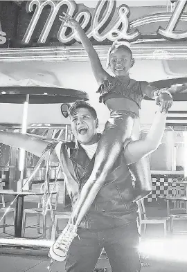  ??  ?? “America’s Got Talent” quarterfinalists Simon & Maria perform during a pre- taping at Mel’s Diner at Universal Studios Hollywood. CHRIS HASTON/ NBC