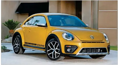  ?? VOLKSWAGEN PHOTOS ?? Inspired by classic Baja Bugs, the Volkswagen Beetle Dune entered the Beetle family as a new trim in 2017.