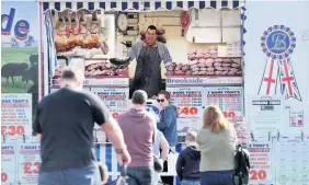  ??  ?? Customers queuing at Tony’s lorry in Newport