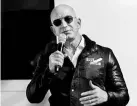  ??  ?? Bezos’ look has become so striking that it has inspired all sorts of comparison­s to pop culture figures like Pitbull ( Spin) and “Terminator­meets-Vin-Diesel-in-Portland” ( BuzzFeed)