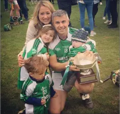  ??  ?? Eugene Heffernan with his wife Lisa and children, Ellie-Mai, Danny and three-month-old Iarlaith, after helping Avondale to Intermedia­te hurling success recently.