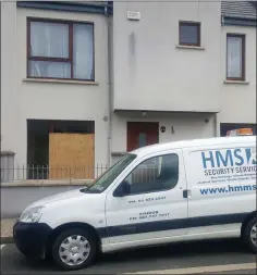  ??  ?? A security van outside the house at Farrankell­y Close earlier this week.