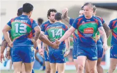  ??  ?? NICE ONE BRO: Innisfail players celebrate a try in the first half of the 36-26 win over Kangaroos.