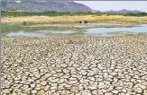  ?? AFP ?? A lake runs dry near Ajmer in June 2019.