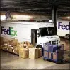  ?? TRAVIS DOVE / THE NEW YORK TIMES ?? Under the new program, FedEx Office will expand to about 10 percent of Walmart’s U.S. stores over the next two years.