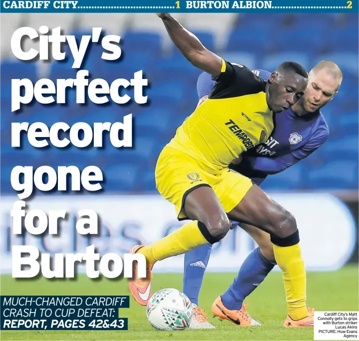  ?? PICTURE: Huw Evans Agency ?? Cardiff City’s Matt Connolly gets to grips with Burton striker Lucas Akins