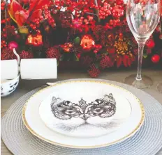  ??  ?? Layering is key when it comes to table settings, such as this one by Knight Varga Interiors featuring a centrepiec­e by Hilary Miles Flowers.