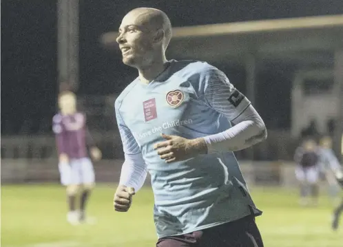  ??  ?? 0 Craig Wighton’s goal clinched victory at Arbroath as Hearts made it two league victories out of two.