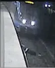  ?? THE ASSOCIATED PRESS FILES ?? Video footage shows a man lying on the subway tracks in Stockholm after he was robbed. The man survived, but lost a foot.