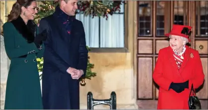  ??  ?? PRAISE: The Prince, pictured with the Duchess of Cambridge and the Queen, said the rollout was ‘a big UK story to tell’