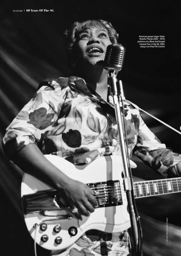  ??  ?? American gospel singer Sister Rosetta Tharpe (1915 – 1973) performs at a Blues And Gospel Caravan Tour in the UK, 1964, using a Les Paul/SG Custom