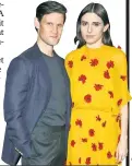  ??  ?? Matt Smith, who plays Mapplethor­pe, andMariann­e Rendón, who plays Patti Smith, pose at an NYC screening of the film about the fotog.