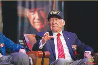  ?? Photos by John Riedy/The Greatest Generation­s Foundation ?? (Left) Richard Ramsey on Queen Mary 2 stage. (Below left) Richard Ramsey’s whiskey, Richard Ramsey of Saugus.