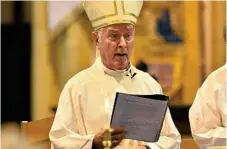  ??  ?? Retired Bishop Clyde Wood leads the Easter Sunday service at St Luke's Anglican Church,