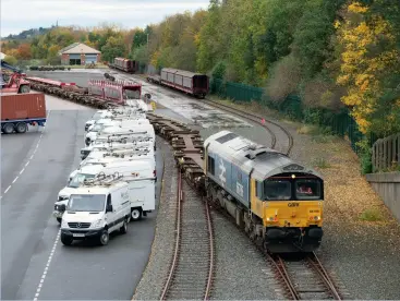  ??  ?? ABOVE: The grandly named Telford Internatio­nal Railfreigh­t Park at Donnington handled a few trains in
2020, although its main use was as a maintenanc­e site for car-carrying wagons. GBRf’s 66789 shunts empty container flats at the terminal on October 30, 2020 before working the 4Z56 1330 departure to Kineton.