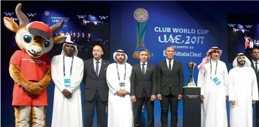  ?? Supplied photo ?? Dignitarie­s and officials seen with the mascot Dhabi the Gazelle at the official draw ceremony for the Fifa Club World Cup UAE 2017 in Abu Dhabi on Monday. —