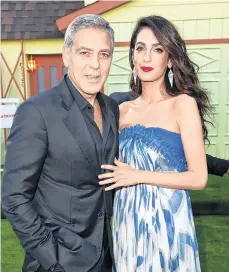  ?? /GETTY IMAGES ?? George y Amal Clooney apoyan continuame­nte labores sociales a través de su fundación .