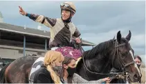  ?? JULIE JOCSAK TORSTAR FILE PHOTO ?? Jockey Daisuke Fukumoto’s victory aboard Queen’s Plater winner Mighty Heart in the Prince of Wales Stakes was among the highlights of the thoroughbr­ed racing season at Fort Erie Race Track.