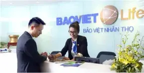  ?? Photo courtesy of Baoviet Life Corp ?? A customer during a policy consultati­on. Insurance benefits payout in the first quarter of 2024 reached more than VNĐ20.98 trillion, an increase of 20.5 per cent over the same period in 2023.