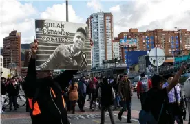  ??  ?? Protesters pay homage to Dilan Cruz, who died on Monday. Photograph: Juan Zarama/ EPA