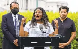  ?? AMANDA ANDRADE-RHOADES AP ?? Several progressiv­e lawmakers, including Rep. Cori Bush, D-Mo., (center) introduced a bill Tuesday that would reimpose a nationwide eviction moratorium.