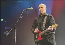  ?? Joel Ryan/Invision 2013 ?? Wilko Johnson plays at a farewell concert in London in 2013. He’d been diagnosed with pancreatic cancer, but he survived it.