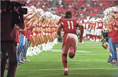  ?? ROB SCHUMACHER/THE REPUBLIC ?? Arizona Cardinals wide receiver Larry Fitzgerald takes the field to play the Oakland Raiders during a preseason game on Thursday in Glendale.