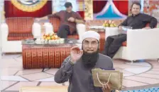  ?? — AFP ?? In this file picture Junaid Jamshed presents a religious quiz show on TV Karachi. in