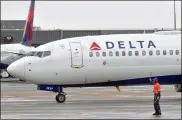  ?? HYOSUB SHIN / HSHIN@AJC.COM ?? In response to the pilot union’s comments on the proposed joint venture, Delta said it is already increasing its flight capacity between the U.S. and U.K. by 15 percent in 2020.