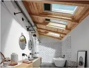  ?? Photo courtesy of Innovative Skylights ?? Bring in light and fresh air to your bathroom space.