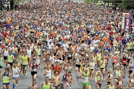  ?? PHOTO PROVIDED ?? Runners take off at the start of last year’s Firecracke­r 4 in Saratoga Springs.