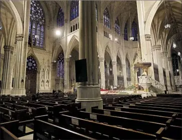  ?? Seth Wenig Associated Press ?? THE HAUL by the Catholic Church included many millions going to dioceses roiled by the clergy sexual abuse scandal. Above, Archbishop Timothy Dolan delivers a homily in April at St. Patrick’s Cathedral in New York.