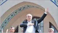  ??  ?? UMIT BEKTAS/REUTERS Muharrem Ince, Turkey’s main opposition Republican People’s Party (CHP) candidate for the upcoming snap presidenti­al election, greets supporters as he starts his campaign in Ankara, Turkey, on May 4, 2018.