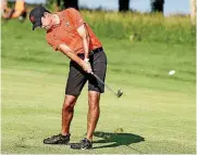  ?? STEVE SISNEY, THE OKLAHOMAN] [PHOTO BY ?? Oklahoma State’s Kristoffer Ventura hits his second shot on No. 17 on Friday during the NCAA men’s golf championsh­ips at Karsten Creek Golf Club in Stillwater.