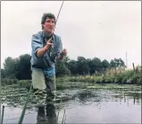  ??  ?? Presenter Jeremy Paxman casts a line