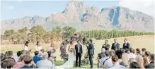 ?? ?? COUPLES can exchange vows against the backdrop of Table Mountain or host a reception in a luxurious wine estate in the Western Cape. | Instagram